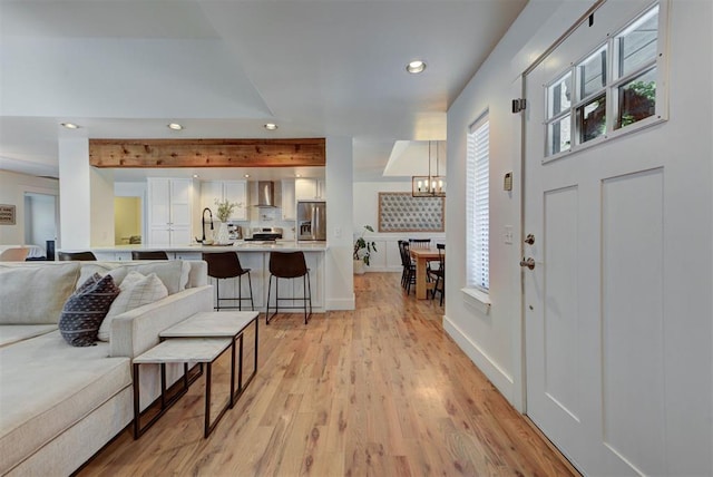 1001 Fountain Gate Cir, Norman, OK 73072 - foyer with recessed lighting, light wood finished floors, plenty of natural light, and a chandelier