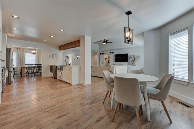 1001 Fountain Gate Cir, Norman, OK 73072 - dining space featuring a chandelier, light wood-style flooring, recessed lighting, and a ceiling fan