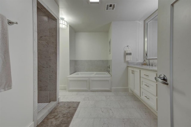 1001 Fountain Gate Cir, Norman, OK 73072 - bathroom featuring vanity, a bath, walk in shower, and marble finish floors