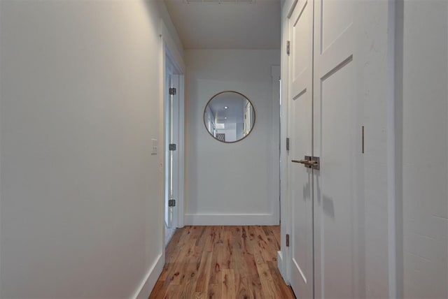 1001 Fountain Gate Cir, Norman, OK 73072 - hallway featuring light wood finished floors and baseboards