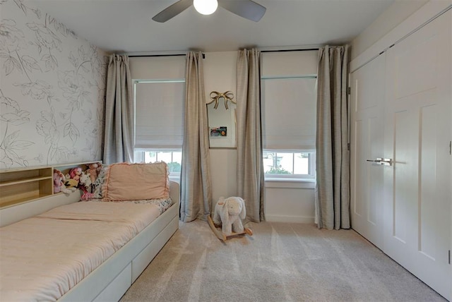 1001 Fountain Gate Cir, Norman, OK 73072 - bedroom with carpet flooring, wallpapered walls, and a ceiling fan