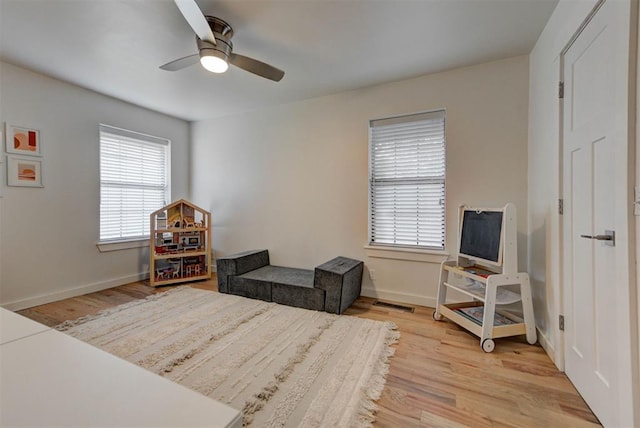 1001 Fountain Gate Cir, Norman, OK 73072 - bedroom featuring wood finished floors and ceiling fan