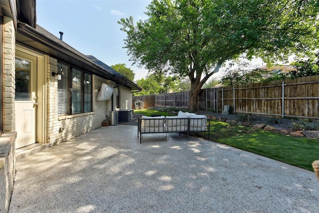 1001 Fountain Gate Cir, Norman, OK 73072 - fenced backyard featuring a patio area