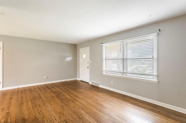 3020 NW 71st St, Oklahoma City, OK 73116 - empty room with wood finished floors