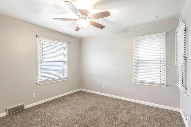 3020 NW 71st St, Oklahoma City, OK 73116 - carpeted empty room featuring ceiling fan and baseboards