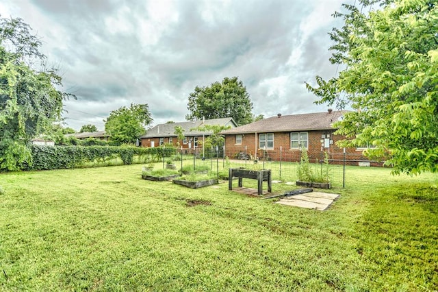 3020 NW 71st St, Oklahoma City, OK 73116 - view of yard with a garden
