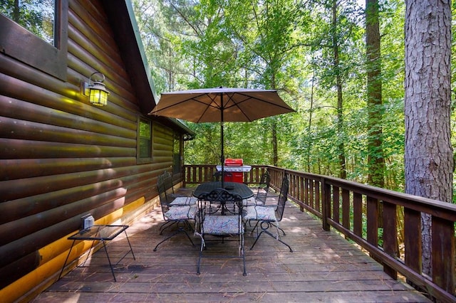 244 Hiddenwater Rd, Broken Bow, OK 74728 - wooden deck featuring outdoor dining space