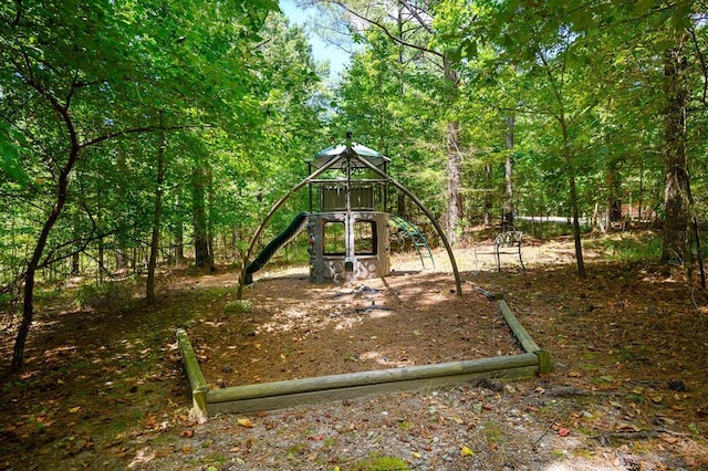 244 Hiddenwater Rd, Broken Bow, OK 74728 - community playground with a forest view