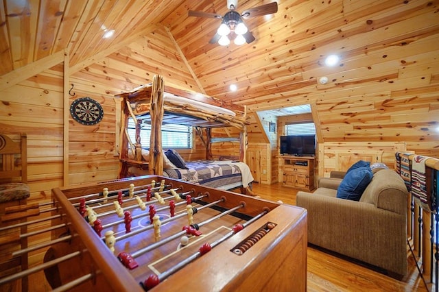 244 Hiddenwater Rd, Broken Bow, OK 74728 - rec room with light wood-type flooring, wood walls, wood ceiling, ceiling fan, and plenty of natural light