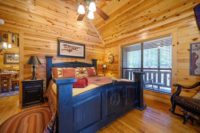 244 Hiddenwater Rd, Broken Bow, OK 74728 - bedroom with lofted ceiling, light wood finished floors, wooden ceiling, and wooden walls