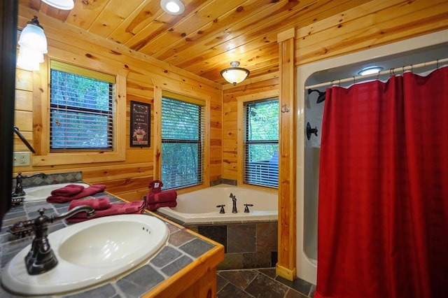 244 Hiddenwater Rd, Broken Bow, OK 74728 - bathroom featuring a bath, stone tile floors, a shower with shower curtain, wooden walls, and vanity