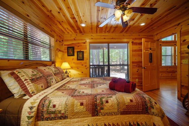 244 Hiddenwater Rd, Broken Bow, OK 74728 - bedroom with wooden walls, wood finished floors, recessed lighting, and wooden ceiling