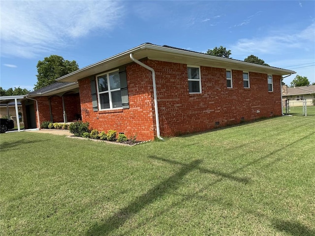 1901 N Oklahoma Ave, Shawnee, OK 74804 - view of property exterior featuring crawl space and brick siding