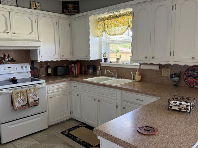 1901 N Oklahoma Ave, Shawnee, OK 74804 - kitchen with electric stove, under cabinet range hood, white cabinetry, and backsplash