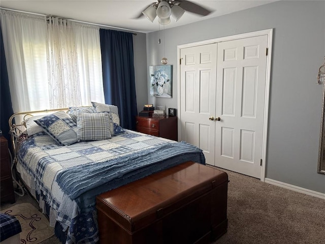 1901 N Oklahoma Ave, Shawnee, OK 74804 - carpeted bedroom featuring a closet and a ceiling fan