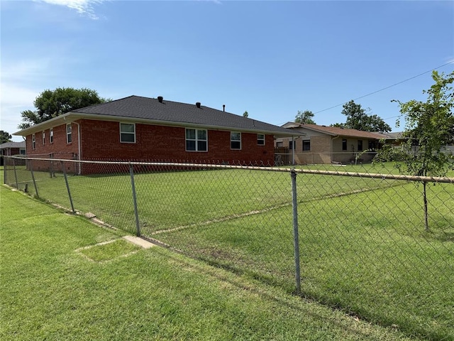 1901 N Oklahoma Ave, Shawnee, OK 74804 - rear view of property featuring brick siding