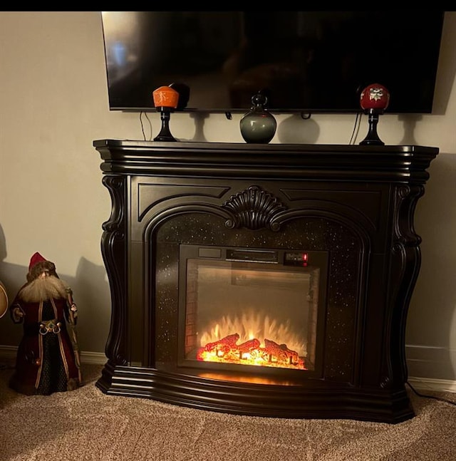 1901 N Oklahoma Ave, Shawnee, OK 74804 - detailed view of carpet and a glass covered fireplace