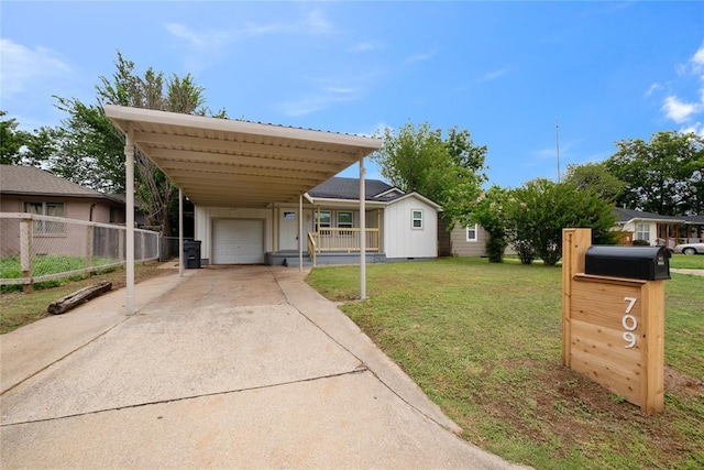 709 SW Jefferson Ave, Lawton, OK 73501 - view of front of home featuring a carport, driveway, and covered porch