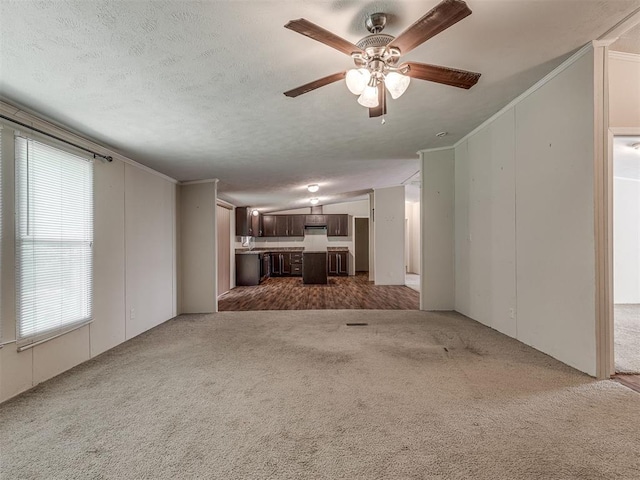 355370 E 970th Rd, Sparks, OK 74869 - unfurnished living room with carpet, ceiling fan, lofted ceiling, and crown molding