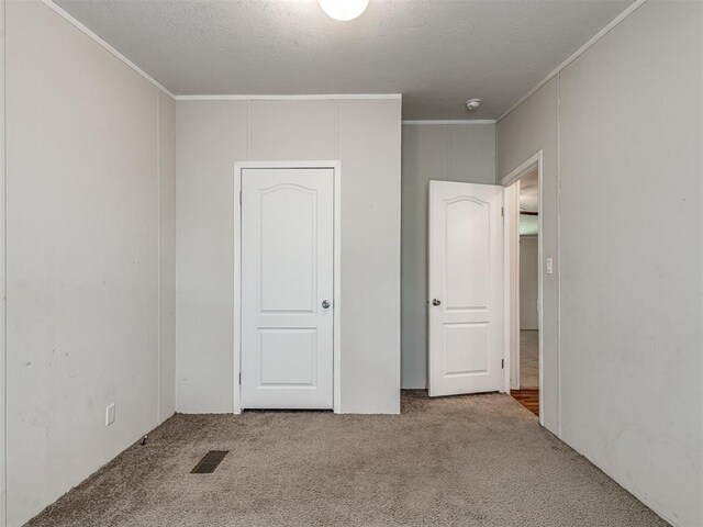 355370 E 970th Rd, Sparks, OK 74869 - unfurnished bedroom with carpet and ornamental molding