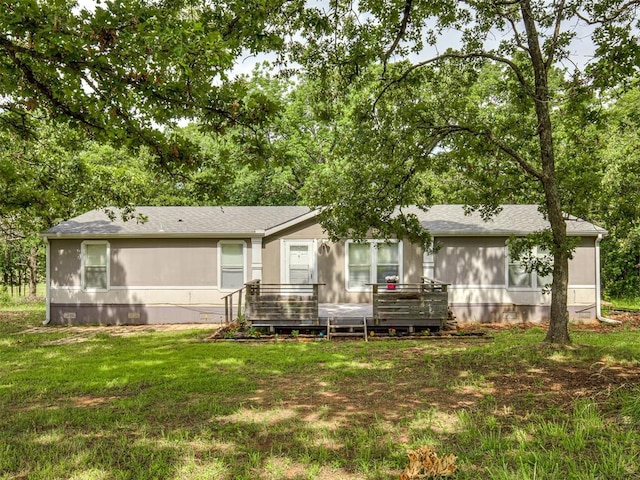 355370 E 970th Rd, Sparks, OK 74869 - rear view of property with a yard, a deck, and a shingled roof