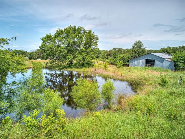 355370 E 970th Rd, Sparks, OK 74869 - water view with an outbuilding