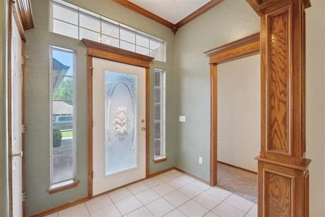 12417 Sussex Dr, Oklahoma City, OK 73130 - foyer with ornamental molding and light tile patterned flooring