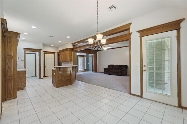 12417 Sussex Dr, Oklahoma City, OK 73130 - kitchen featuring open floor plan, light countertops, a chandelier, light carpet, and healthy amount of natural light