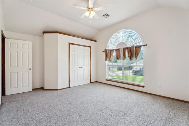 12417 Sussex Dr, Oklahoma City, OK 73130 - unfurnished bedroom with lofted ceiling, carpet flooring, a closet, and ceiling fan