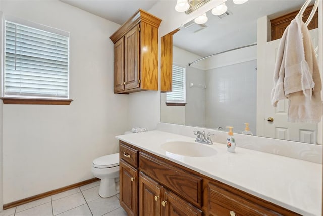 12417 Sussex Dr, Oklahoma City, OK 73130 - full bathroom featuring vanity, a shower, and tile patterned flooring