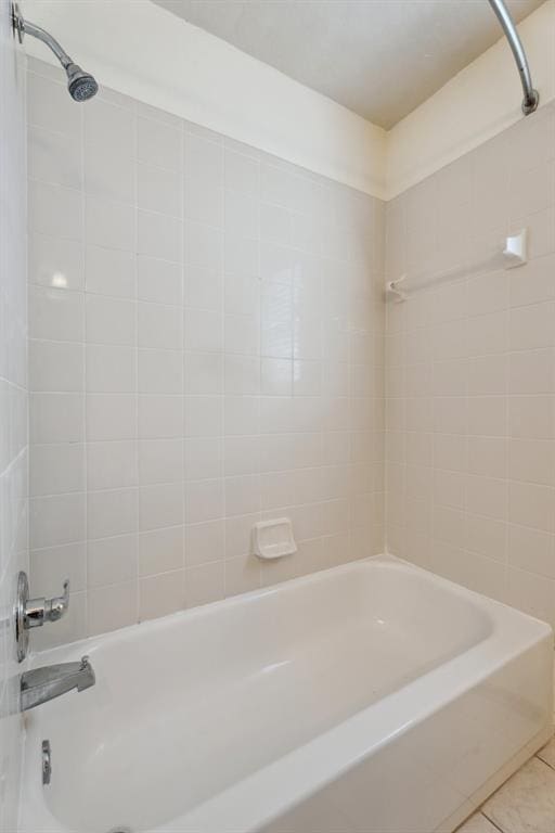12417 Sussex Dr, Oklahoma City, OK 73130 - bathroom featuring washtub / shower combination and tile patterned floors