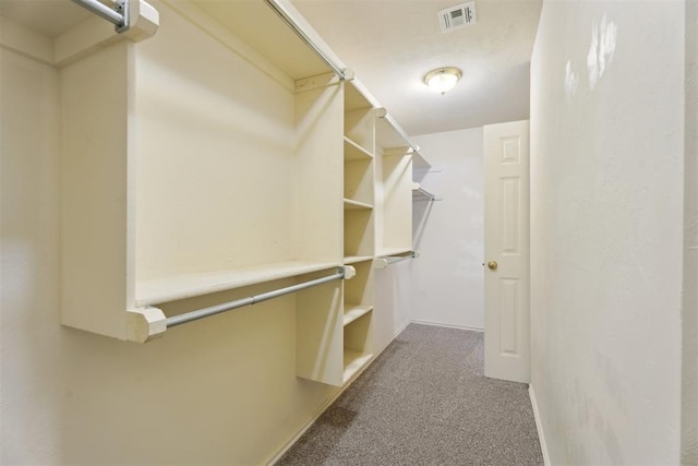 12417 Sussex Dr, Oklahoma City, OK 73130 - spacious closet featuring carpet flooring