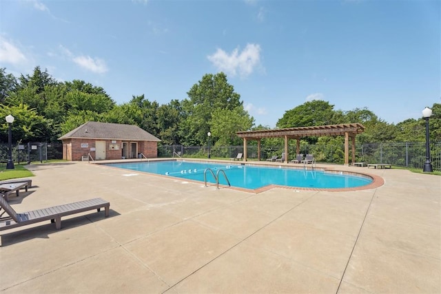 12417 Sussex Dr, Oklahoma City, OK 73130 - community pool with a pergola, a patio, and view of scattered trees
