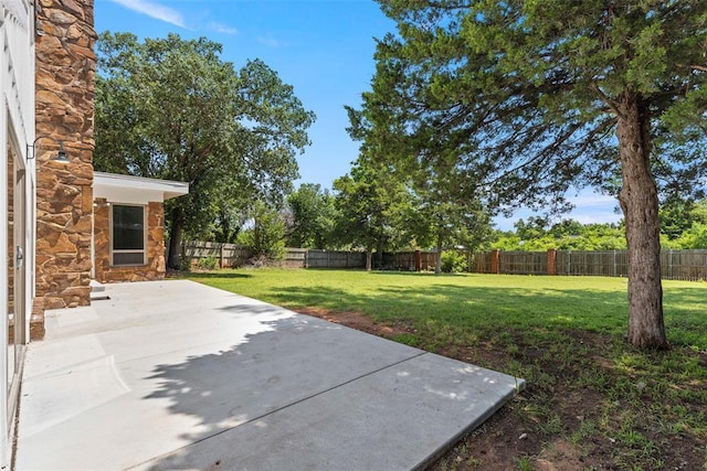 2104 Brookhaven Dr, Edmond, OK 73034 - fenced backyard with a patio