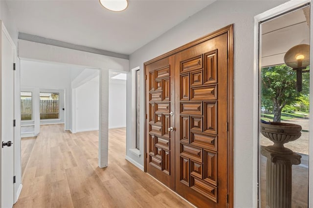 2104 Brookhaven Dr, Edmond, OK 73034 - entryway featuring light wood finished floors and baseboards