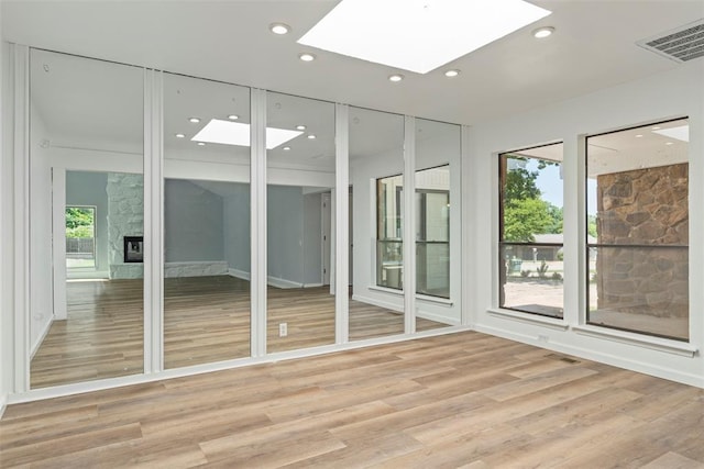 2104 Brookhaven Dr, Edmond, OK 73034 - unfurnished sunroom with a skylight and healthy amount of natural light