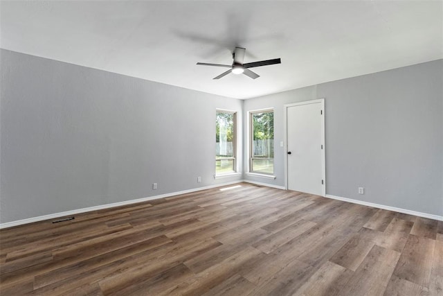2104 Brookhaven Dr, Edmond, OK 73034 - spare room with ceiling fan and wood finished floors