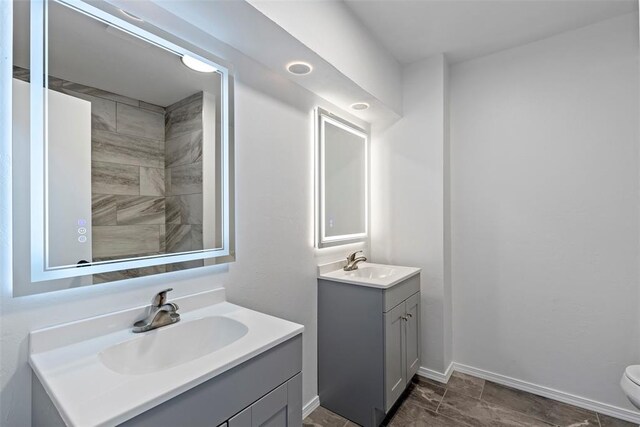 2104 Brookhaven Dr, Edmond, OK 73034 - bathroom featuring vanity and toilet