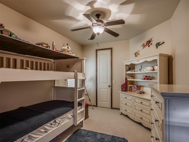 16208 Windrush Pl, Edmond, OK 73013 - bedroom featuring light colored carpet and a ceiling fan