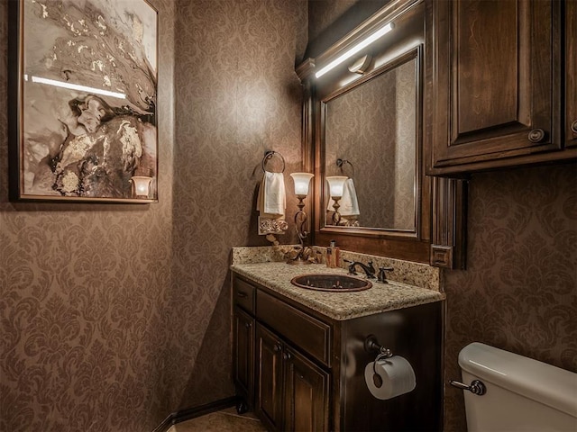 16208 Windrush Pl, Edmond, OK 73013 - half bath with wallpapered walls and vanity