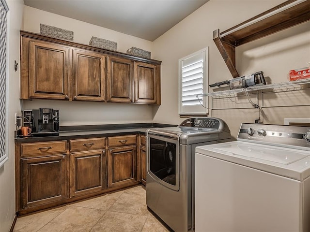 16208 Windrush Pl, Edmond, OK 73013 - laundry room with washer and dryer, cabinet space, and light tile patterned floors