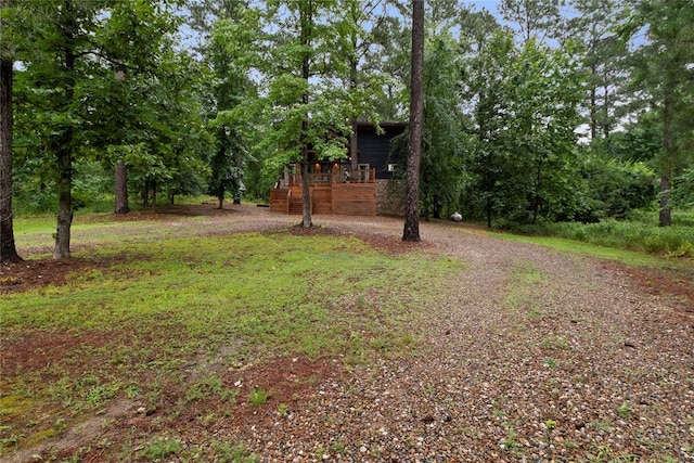 180 Black Jack Trl, Hochatown, OK 74728 - view of yard featuring a deck