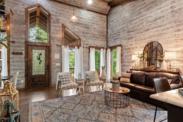 180 Black Jack Trl, Hochatown, OK 74728 - living area featuring a towering ceiling and hardwood / wood-style floors