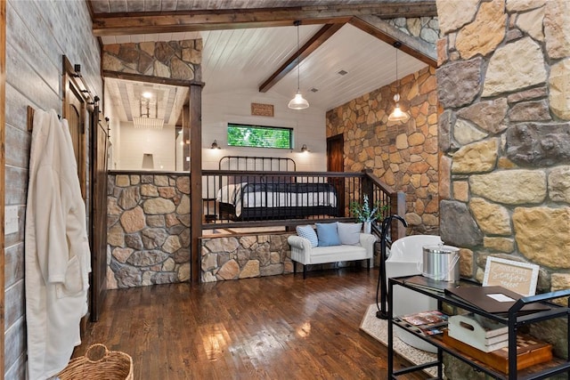 180 Black Jack Trl, Hochatown, OK 74728 - bedroom featuring wood-type flooring and a barn door