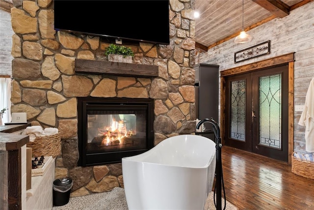 180 Black Jack Trl, Hochatown, OK 74728 - foyer entrance with hardwood / wood-style flooring, a fireplace, and a wood ceiling with exposed beams
