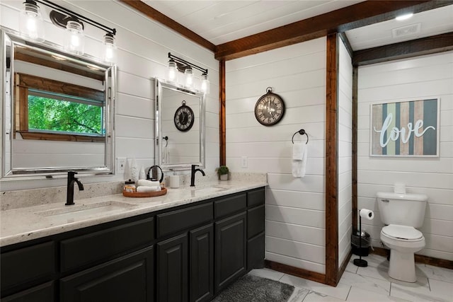 180 Black Jack Trl, Hochatown, OK 74728 - full bathroom featuring double vanity and wood walls