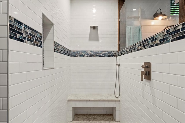 180 Black Jack Trl, Hochatown, OK 74728 - bathroom with tile walls and tiled shower