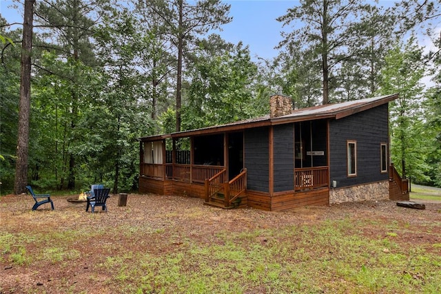180 Black Jack Trl, Hochatown, OK 74728 - view of front of home featuring a chimney