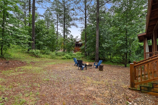 180 Black Jack Trl, Hochatown, OK 74728 - view of yard with an outdoor fire pit