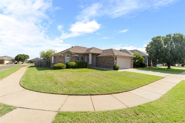 2321 NW 162nd Ter, Edmond, OK 73013 - single story home featuring brick siding, driveway, and an attached garage